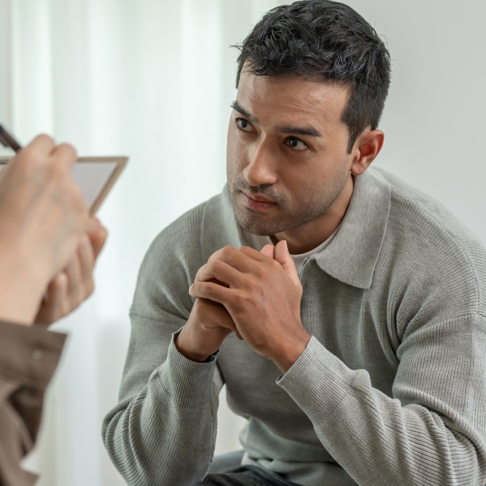 man with mental health problems is consulting. psychiatrist is recording the patient's condition for treatment. encouragement, love and family problem, bipolar , depression patient, protect suicide